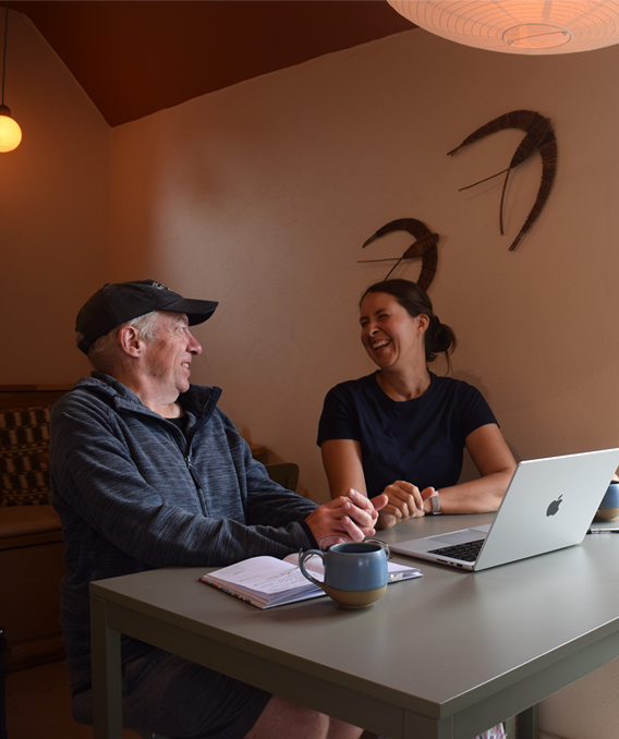 Photo of Patrick and Charlotte working on the Naturally Bread website.